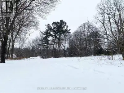 Nestled among mature trees with stunning views in a sought-after Port Hope neighbourhood, this uniqu...