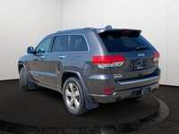 This Jeep Grand Cherokee has a dependable Regular Unleaded V-8 5.7 L/345 engine powering this Automa... (image 3)