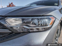 *The pre-owned 2023 Volkswagen Jetta Comfortline* is a stylish and refined sedan designed for driver... (image 8)