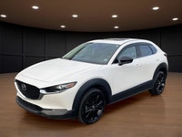 The 2022 Mazda CX-30 GT w/Turbo AWD in stunning white exudes confidence and offers a smooth handling... (image 1)