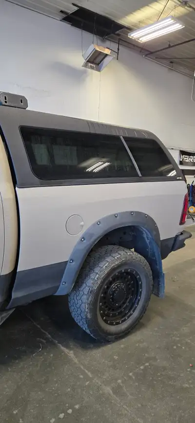 This cap is in excellent condition, A.R.E top of the line canopy. Rock guarded sprayed black. Front...