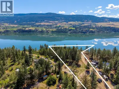 Discover one of Lake Country’s most exceptional view properties. This rare 3.85-acre estate parcel c...