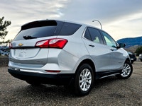 Presenting the 2019 Chevrolet Equinox LT, a sophisticated gray AWD SUV that promises excellent handl... (image 1)