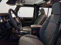 This 2026 JEEP WRANGLER 4-DOOR SPORT has the following options Cloth Low-Back Bucket Seats, Remote S... (image 9)