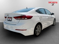 a practical compact sedan known for its reliability and value. It features a fuel-efficient 2.0L eng... (image 3)