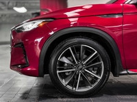 The 2025 INFINITI QX55 ESSENTIAL is a luxury crossover coupe that combines the athletic silhouette o... (image 8)
