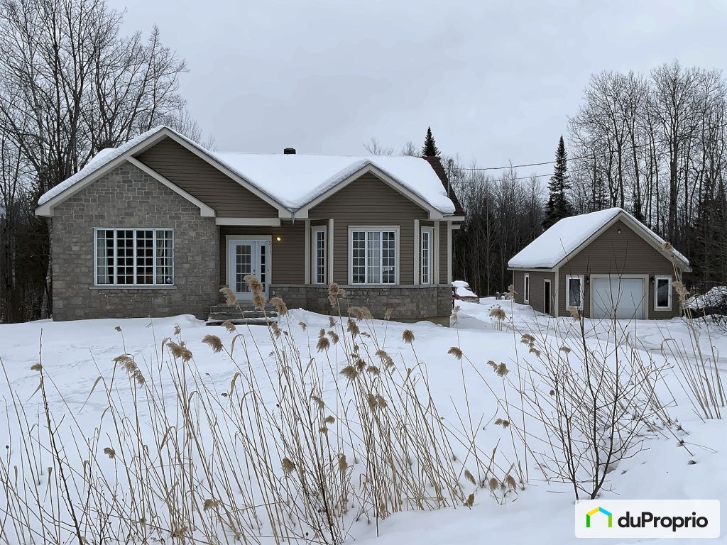 $769,500 - Bungalow for sale in Sherbrooke (St-Élie-d'Orford) — photo 1