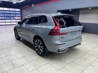 The 2024 Volvo XC60 B5 AWD Plus Dark Theme in a stunning blue finish is engineered for those who dem... (image 7)