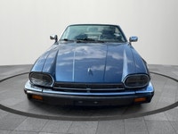 This 1989 Jaguar XJ Sport, finished in Blue, delivers classic British luxury and performance. Key Fe... (image 1)