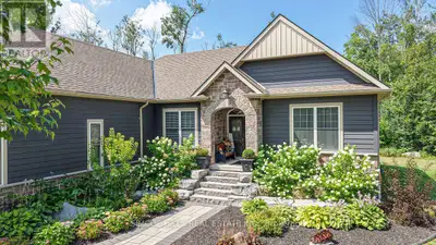Stunning Bungalow-Wildwood Estates-Bass Lake Woodlands. 3 bed 3 bath home set on a private 1A lot bl...