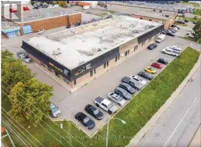 Automotive-zoned industrial/commercial unit totalling 6,762 sq.ft. for lease in a high-exposure auto...
