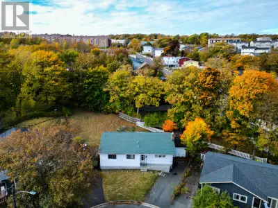 Located on a large pie-shaped lot at the end of a quiet cul-de-sac, this property is surrounded by m...