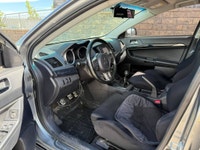 This 2014 Mitsubishi Lancer Evolution delivers pure performance with its turbocharged 2.0L engine, a... (image 6)