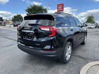 Command the road in this sleek 2018 GMC Terrain SLE, boasting a powerful 1.5L Turbo engine and a wea... (image 4)