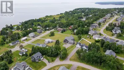 23 Paget Cres!...Welcome to Your Custom-Built Designer Home with Water Views & Two Legal Basement Su...