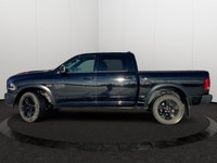 This Ram 1500 Classic has a strong Regular Unleaded V-8 5.7 L/345 engine powering this Automatic tra... (image 1)