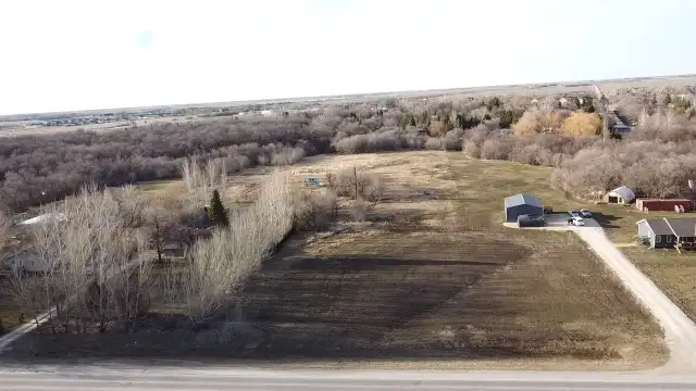 Rare chance to own a 3.6 acre riverfront lot in Lorette!