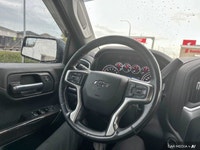 Unleash the power of the 2021 Chevrolet Silverado 1500 RST Crew Cab. This robust truck boasts a pote... (image 9)