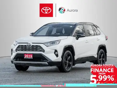 The 2019 Toyota RAV4 Hybrid XSE in pristine white exudes confidence on the road with its capable AWD...