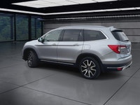 The 2021 Honda Pilot Touring 8-Passenger AWD in Silver is an exceptional choice for those seeking a... (image 5)