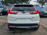 Experience an exceptional driving journey in the 2017 Honda CR-V Touring, featuring an immaculate wh... (image 5)