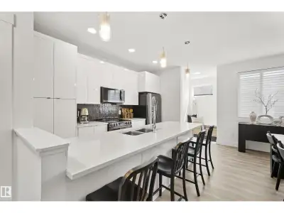 NO CONDO FEES | DOUBLE DETACHED GARAGE | CENTRAL A/C | 2023-BUILT HOME. This beautifully maintained,...