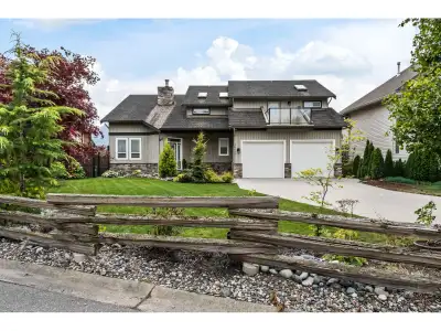 Breathtaking panoramic views of the Chilliwack River Valley define this exceptional residence situat...