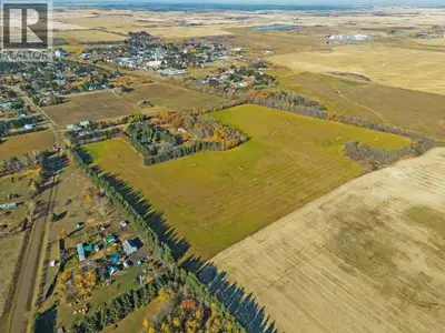 A rare find!!! 37 acres with 3 bedroom home, triple car garage, hip roof barn with loft, pole shed,...