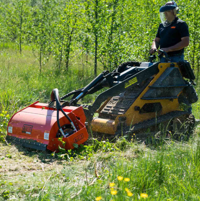 The Sidewinder Mini Skid Steer Brush Cutter features a high-speed dual-blade system and rugged desig...