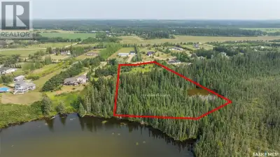 Spacious 4.3-acre titled building lot in Lakeridge Estates, located in the RM of Buckland. This scen...