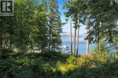 Welcome to 6649 Godman Road, this stunning 2.06 acre waterfront property offering includes a 0.427 a...