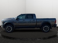 This 2026 RAM 2500 REBEL/POWERWAGON CREW CAB has the following options Leather Trimmed Bucket Seats,... (image 1)