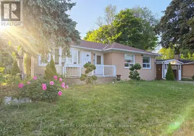 An Excellent bungalow features 'Two Separate Driveways' On Large Corner Lot. One large enclosed park...