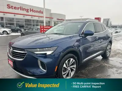 The 2023 Buick Envision Essence, presented in a sophisticated Gray finish, masterfully blends luxuri...