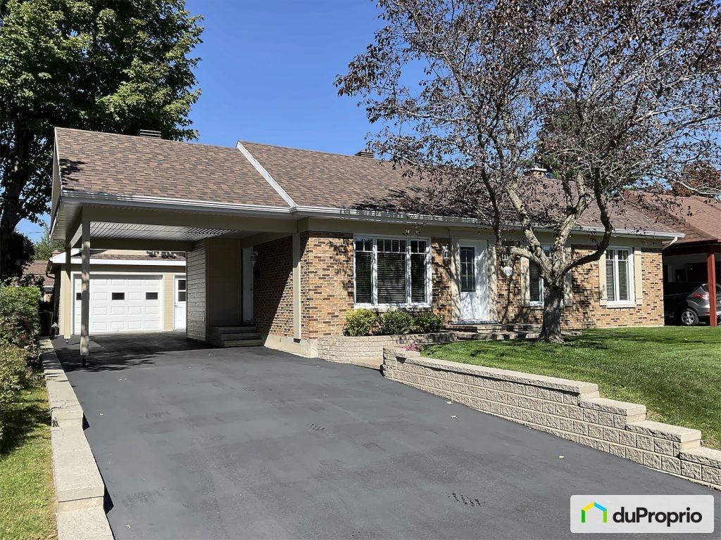 $650,000 - Bungalow for sale in Neufchatel — photo 1