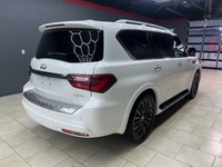 Experience luxury and power with the stunning 2024 INFINITI QX80 LUXE, presented in a sophisticated... (image 4)