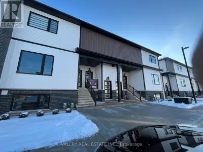 Spacious 2-bedroom, 2-bathroom stacked townhouse with 1 parking space available, ideally located at...