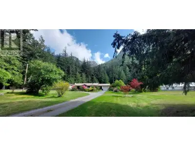 A 3 bedroom, 2 bathroom, solidly built rancher, with a large 200 amp shop, greenhouse and storage sh...