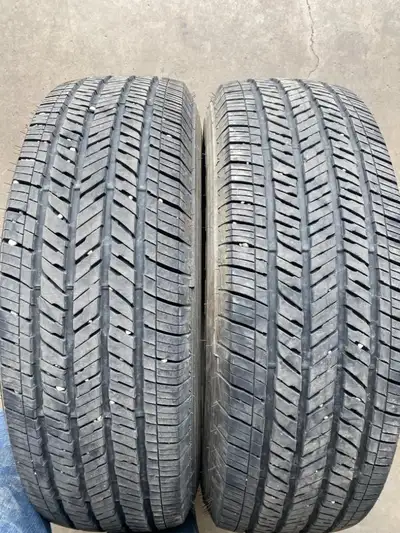 Two Used 255/70R18 113T Bridgestone Dueler H/T tires. In good condition 8/32 tread remaining. Both t...
