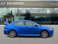 Octane Blue Pearl 4D Sedan 2.0L DOHC 5-Speed Manual AWD AWD, 4-Wheel Disc Brakes, ABS brakes, Air Co... (image 1)