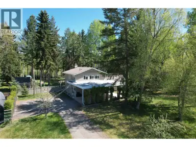 ACREAGE IN THE CITY! Welcome to 144 N Enemark Road in SOUTH HILLS - city services on 1.08 park like...