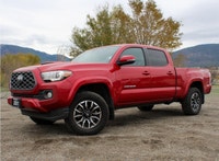 The 2021 Toyota Tacoma 4x4 Double Cab Auto is a striking truck that demands attention, dressed in a... (image 1)