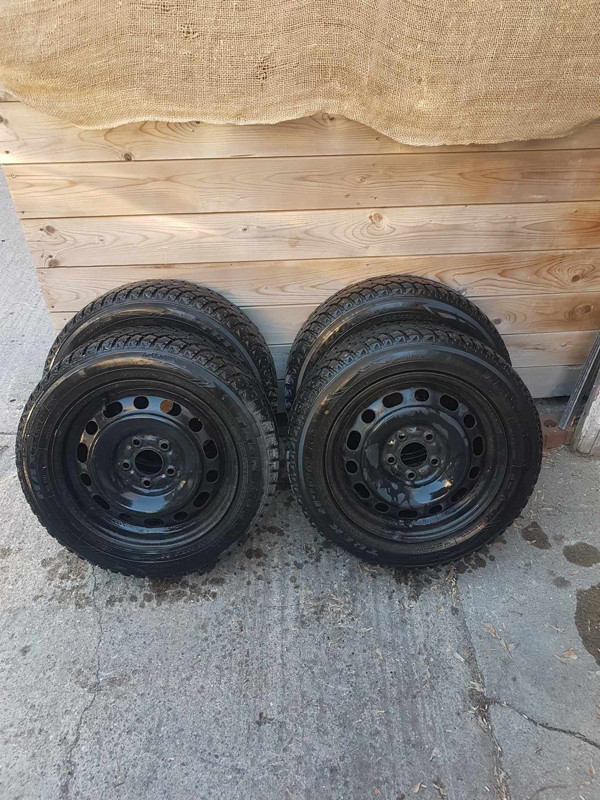 205 55 16   STUDDED WINTER TIRES on MAZDA 5 METAL RIMS in Tires & Rims in City of Montréal