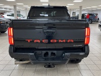 Engineered for drivers who want capability without compromising conscience, this 2025 Toyota Tacoma... (image 4)