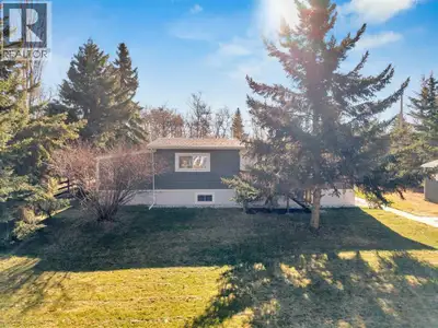 Small town living with big space! This double-wide home has been VERY well updated and VERY well mai...