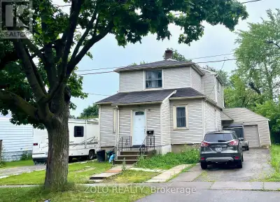 Great downtown Investment opportunity! Legal duplex with RL2 zoning. Attached garage. 2 driveways on...