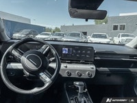 Embark on new adventures in the stunning 2024 Hyundai Kona Preferred Sport Utility, dressed in a sle... (image 9)