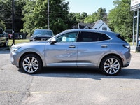 Experience the elegance and sophistication of the 2021 Buick Envision Avenir in a stunning gray exte... (image 4)