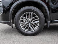 The 2023 Nissan Rogue AWD S in a sleek black hue complements its AWD capabilities, delivering a smoo... (image 5)