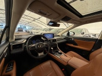 The RX 450h Executive is defined by its "creamy" ride quality and meticulously crafted interior. For... (image 6)